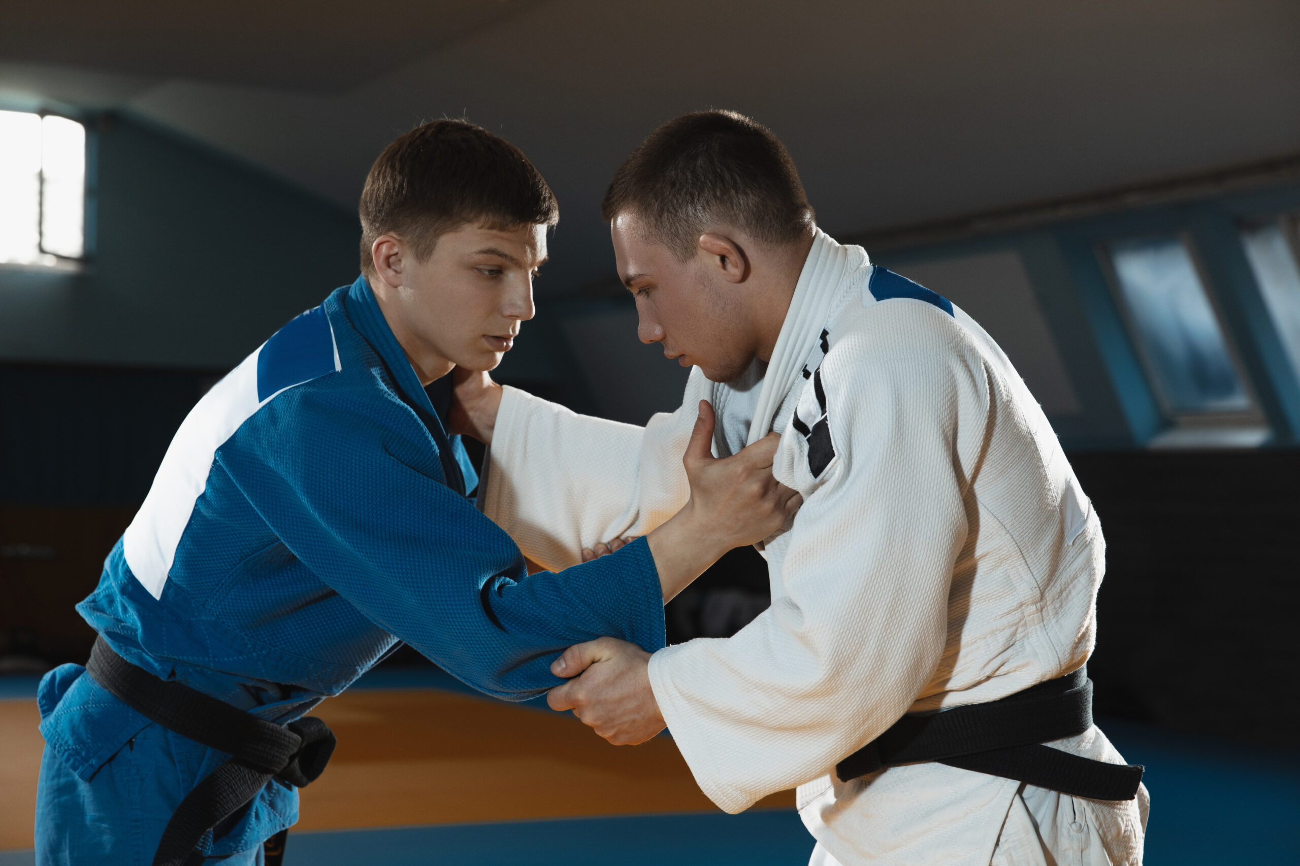 Two judo fighters training in kimono